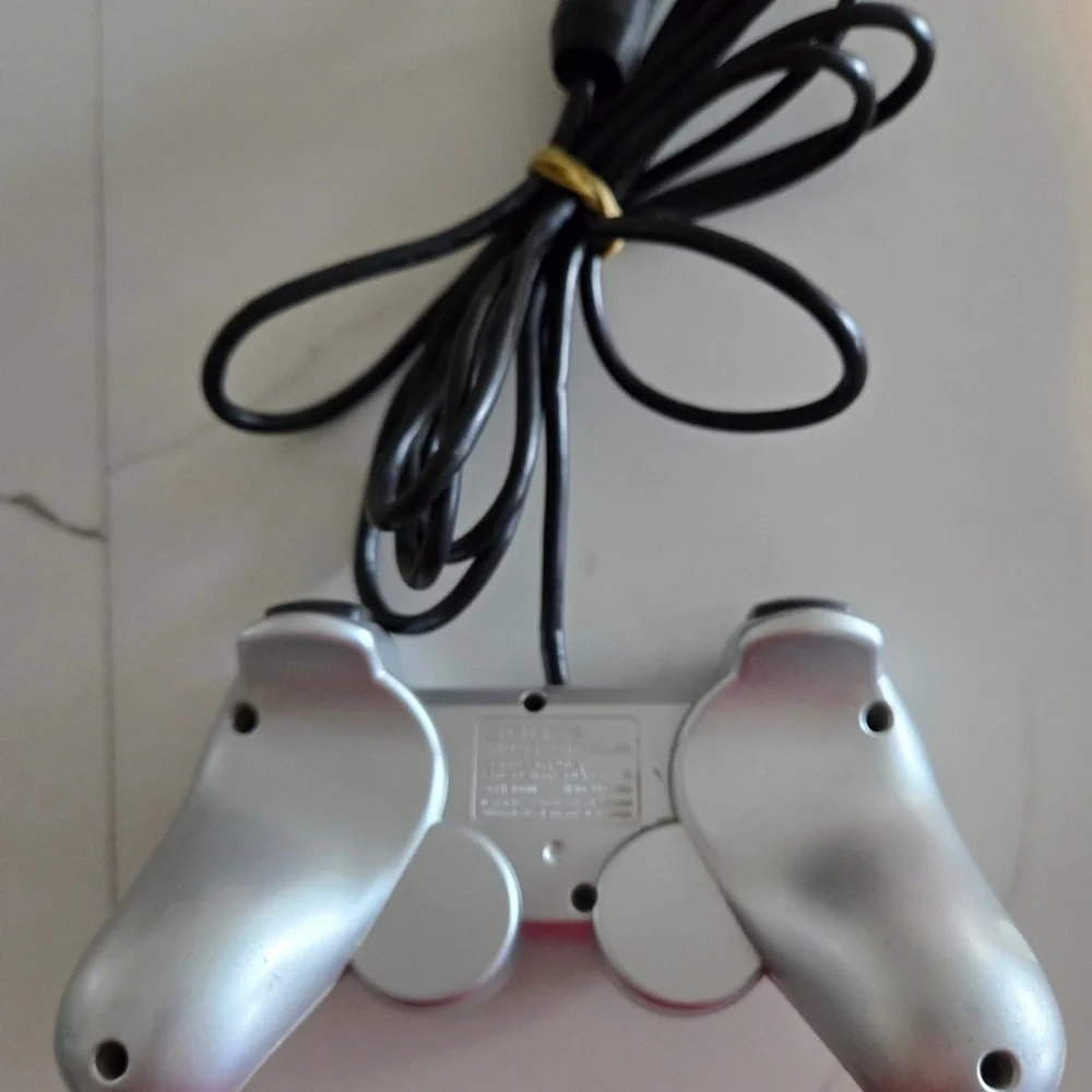 Sony PlayStation 2 Dual Shock Analog Controllers - One Sony‎ And One Unbranded